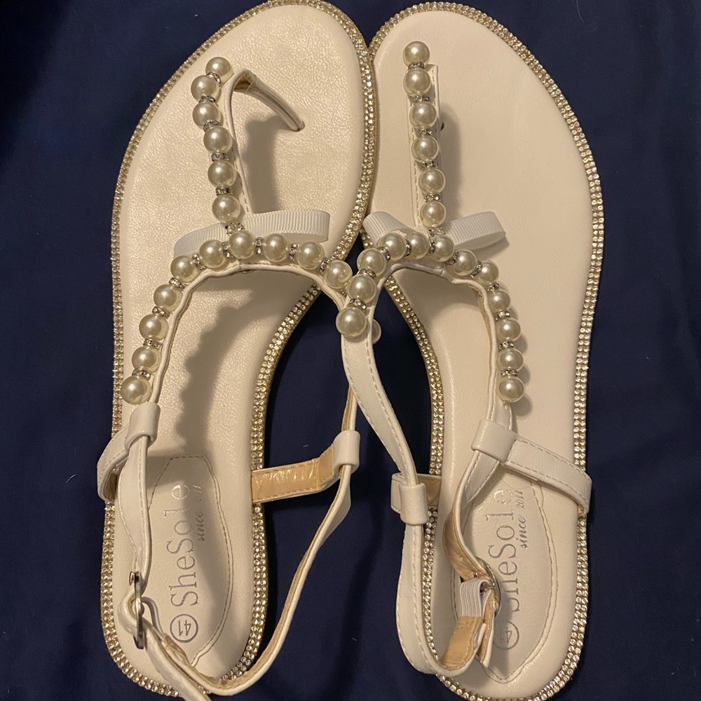 White sandals size 41, fits like a size 11 US.